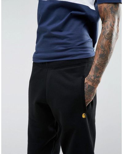 Carhartt WIP Cotton Chase Joggers in Black for Men - Lyst