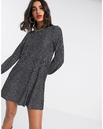 Vestido plisado a lunares en negro y blanco Stradivarius de Tejido  sintético de color Negro | Lyst