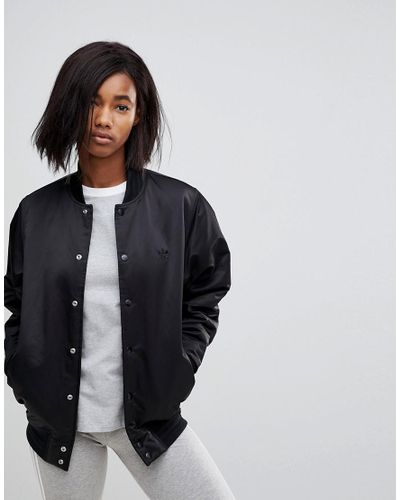 Cazadora bomber en negro con botones de presin de adidas Originals de color  Negro | Lyst