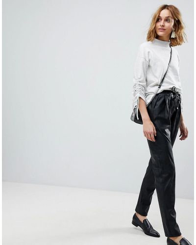 Vero Moda Denim Faux Leather Peg Trousers 34 Length in Black - Lyst