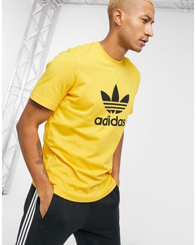 adidas Originals T-shirt With Large Trefoil Logo in Gold (Metallic) for ...