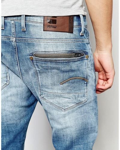 mens jeans with zipper back pockets