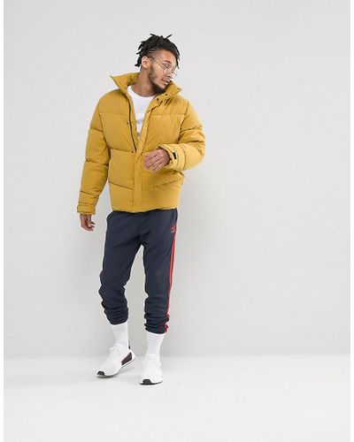 oversized yellow puffer jacket