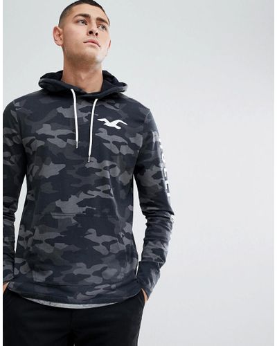 white ripped sweater