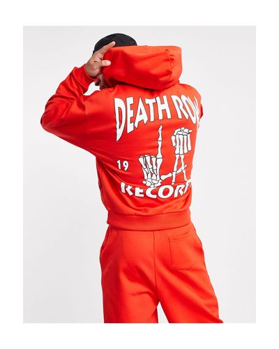 Sudadera roja extragrande con capucha y estampado \