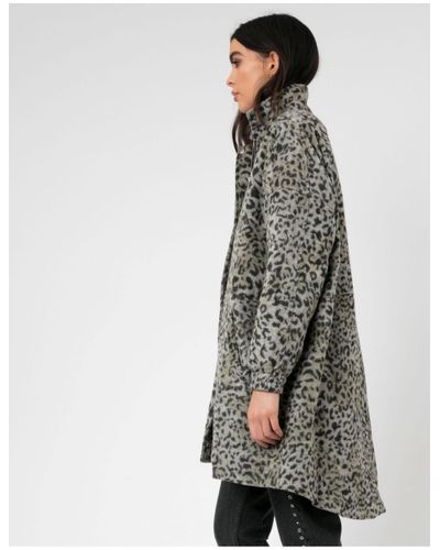 religion leopard coat