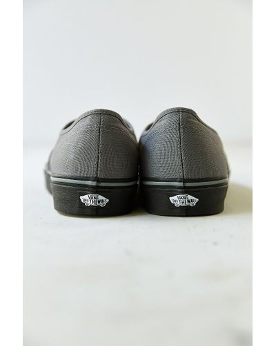 grey vans black sole