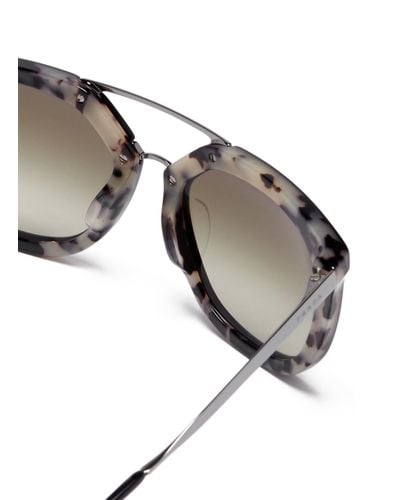 luxottica prada