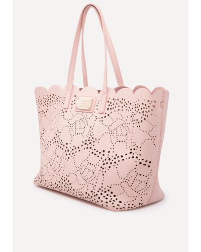 Bebe Charlotte Laser Cut Tote In Blush Pink Lyst
