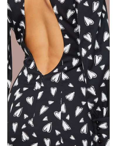 open back ruffle dress