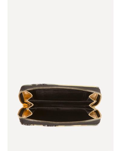 Bebe Synthetic Jane Sequin Camo Wristlet Lyst