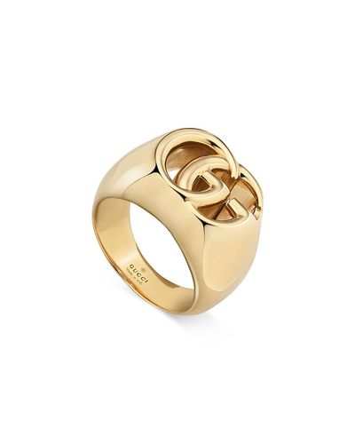 gold gucci ring with red and green