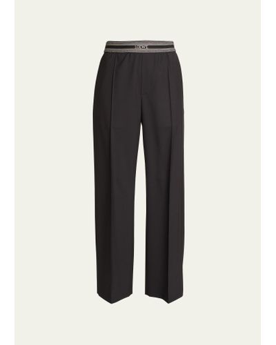 Loewe Pleated-front Pants With Branded Waistband - Black