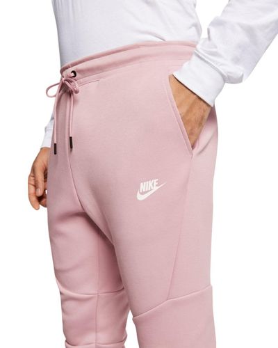 pink nike tech pants