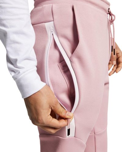 pink nike tech pants