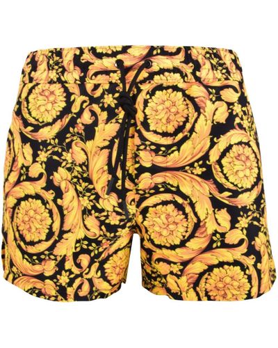 versace gold shorts