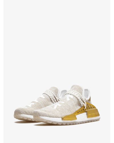 white and gold nmd