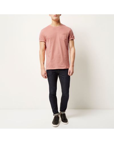 salmon color shirt