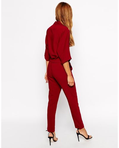 ASOS Jumpsuit With Tie Waist And Long Sleeves in Red - Lyst