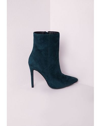 turquoise high heel boots
