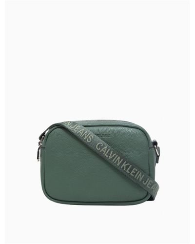 Calvin Klein Ultra Light Double Zip Crossbody Bag in Green | Lyst