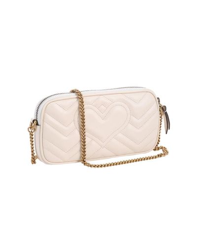 gucci purse with heart on back