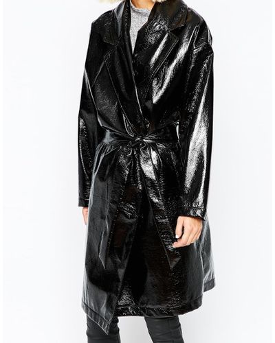 shiny black trench coat