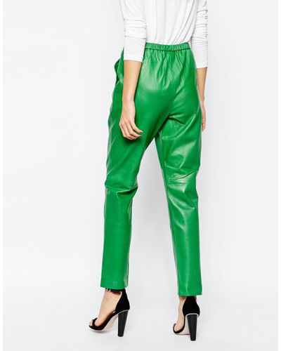 Ganni Passion Leather Trousers in Green - Lyst