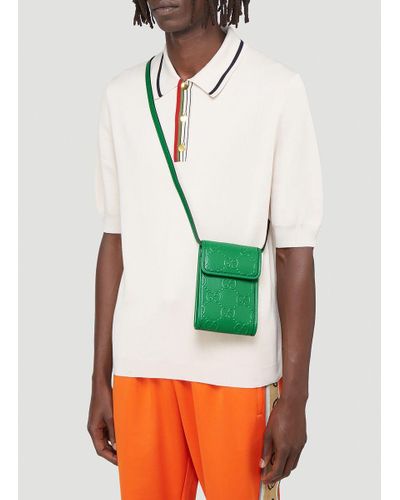 gucci gg embossed mini bolsa