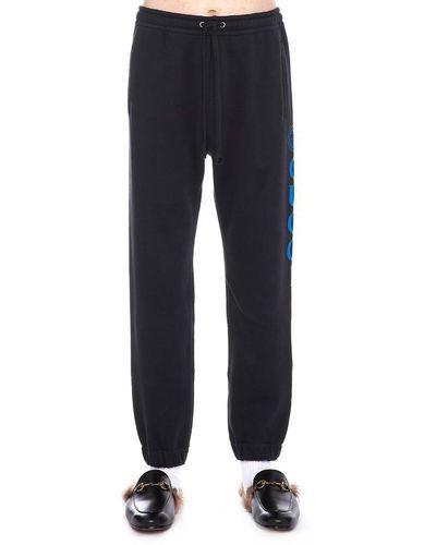 gucci sweatpants black and white