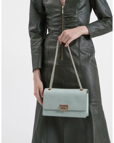 charles and keith textured chain handle bag