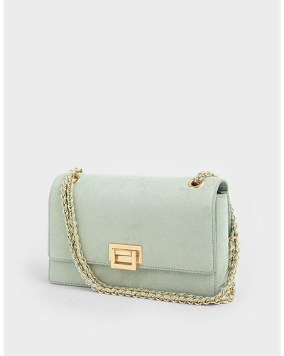 charles and keith textured chain handle bag