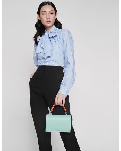 charles and keith two tone chain top handle bag