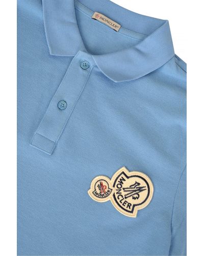 sky blue moncler polo