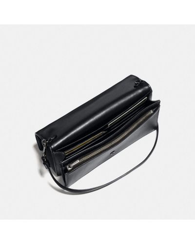 hayden foldover crossbody clutch with floral tooling