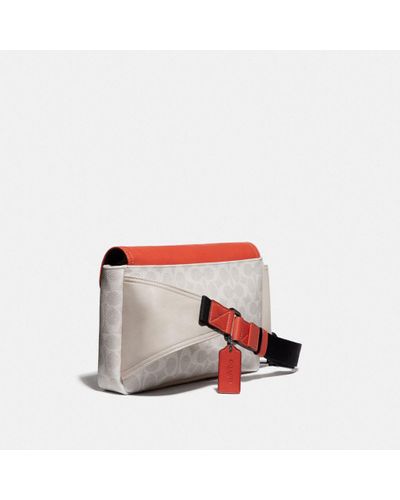 pacer belt bolsa crossbody with coach patch