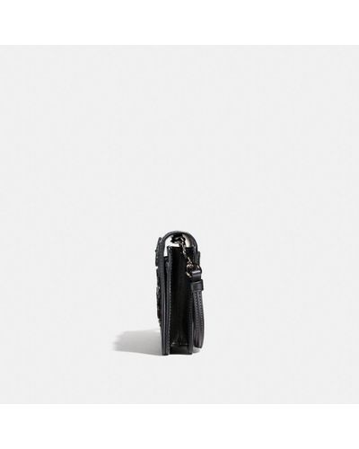 hayden foldover crossbody clutch with floral tooling