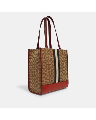 dempsey tote in signature jacquard with patch