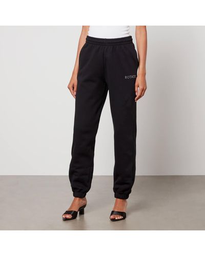 ROTATE SUNDAY Rotate Logo-Embellished Organic Cotton Sweatpants - Black
