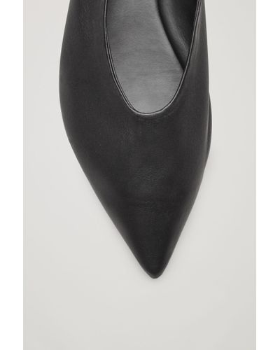 black pointed slip on shoes