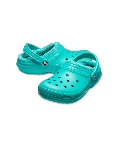 teal fuzzy crocs