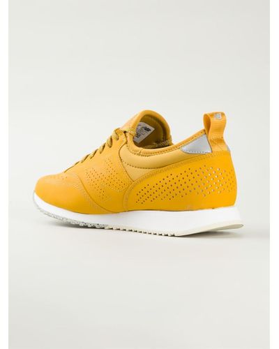 New Balance '600C' Sneakers in Yellow 