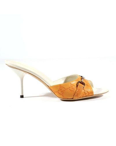 Orange designer sandals hot sale