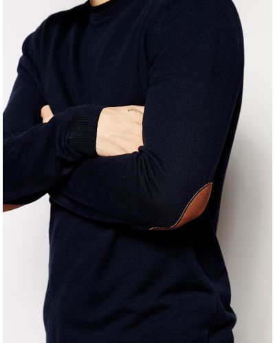navy sweater with elbow patches