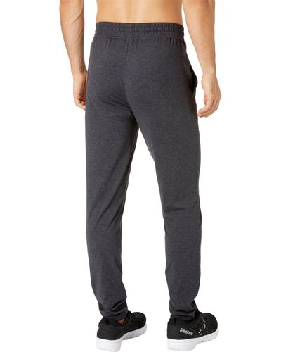 Reebok Synthetic 24/7 Jersey Tapered Pants for Men - Lyst
