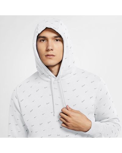 white nike hoodie with logo all over
