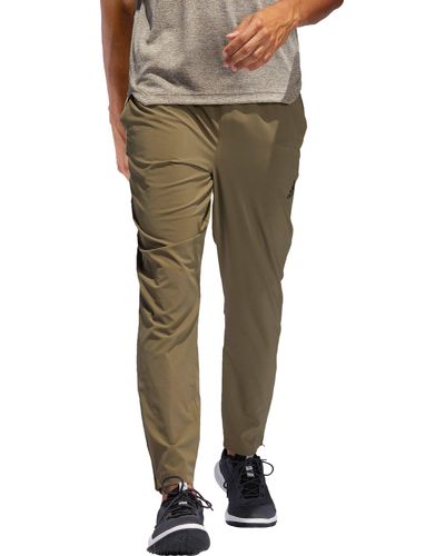 raw khaki adidas pants