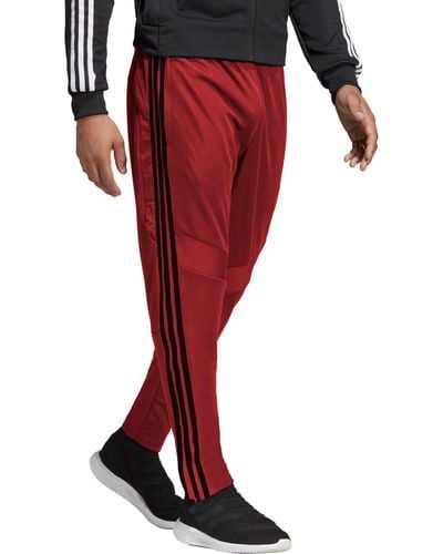 red tiro pants