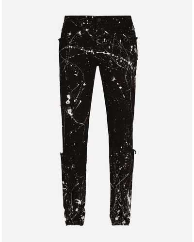 Dolce & Gabbana Skinny Stretch Jeans With Rips And Splash Design - Multicolor