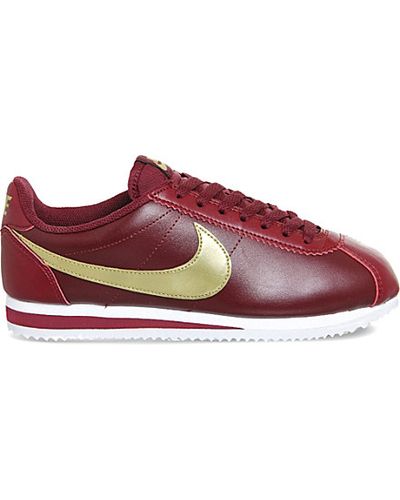 red and gold nike cortez